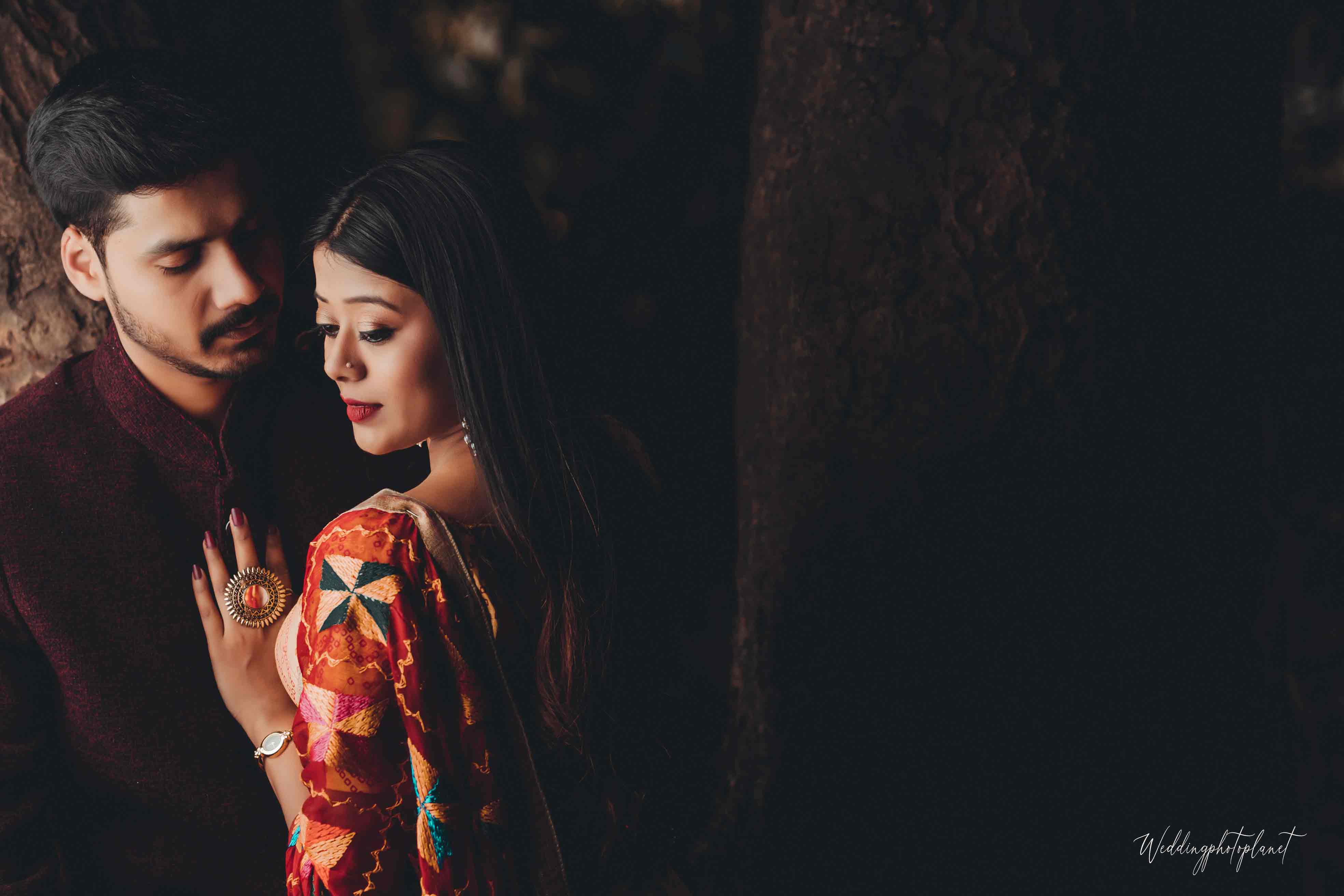 Couple embracing on a bridge