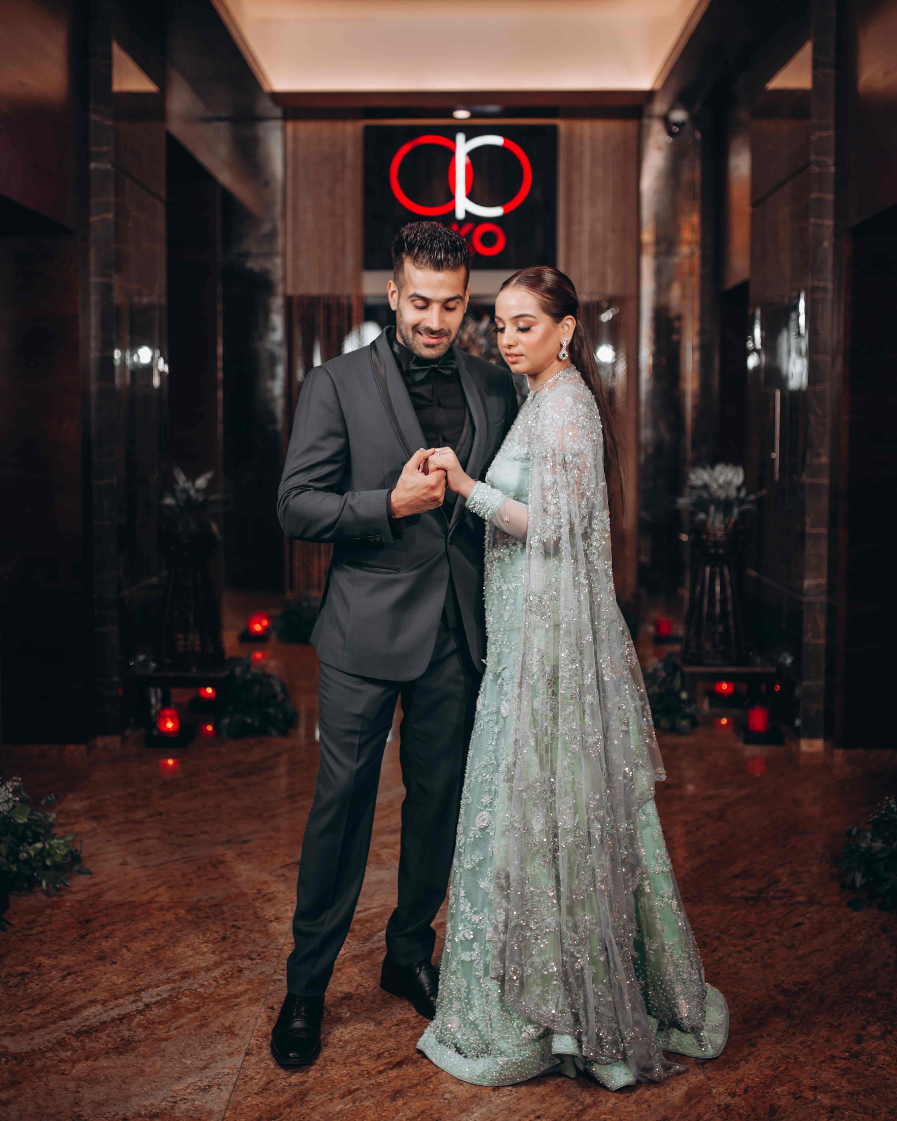 Couple embracing on a bridge