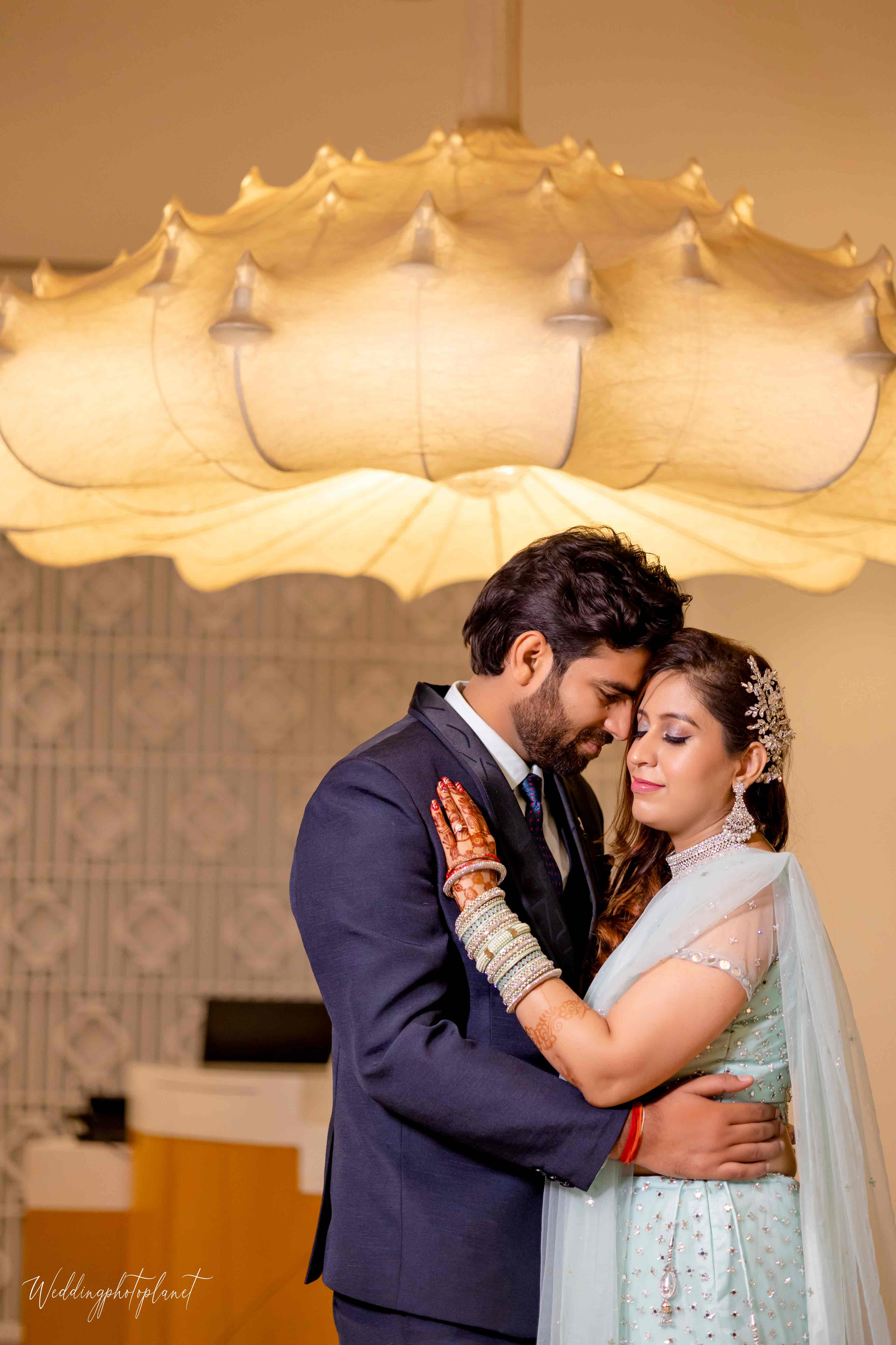 Couple embracing on a bridge
